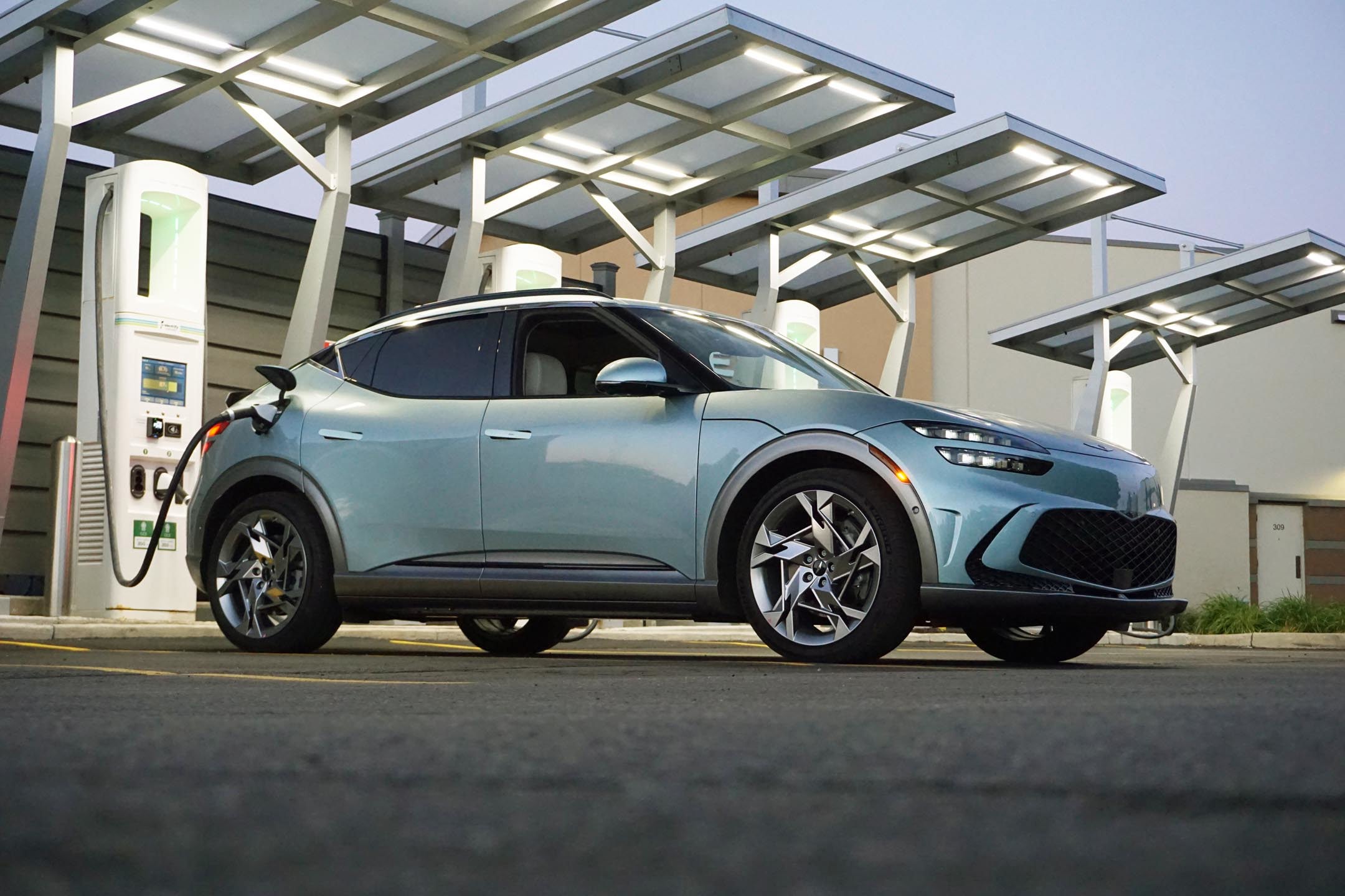 2023 Genesis GV60 Performance AWD plugged into a DC fast charger