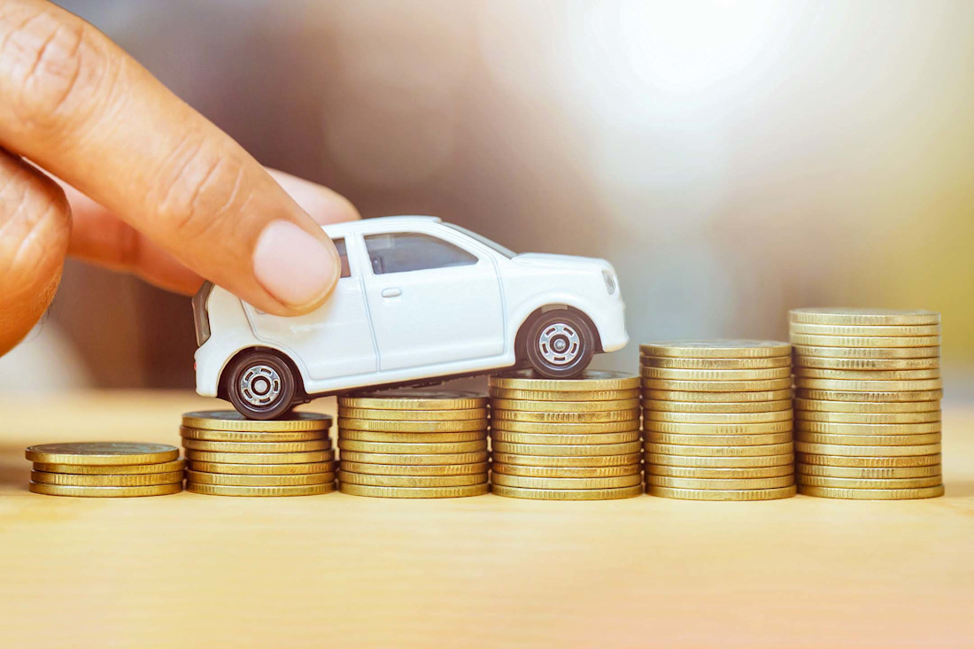 Editorial toy car on coins gettyimages 1158518138 rattankun thongbun