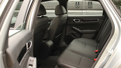 2025 Toyota Prius vs Honda Civic Hybrid Comparison Test Body Image