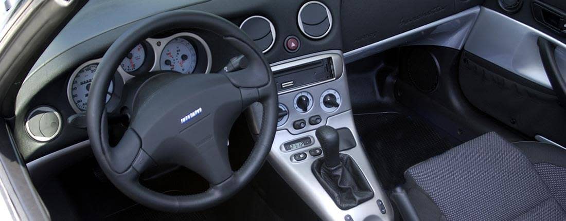 2DM9f8RPO7dZkXcg2gDfv1-c887524e554cc961834d3ce01b467697-fiat-barchetta-l-03-1100