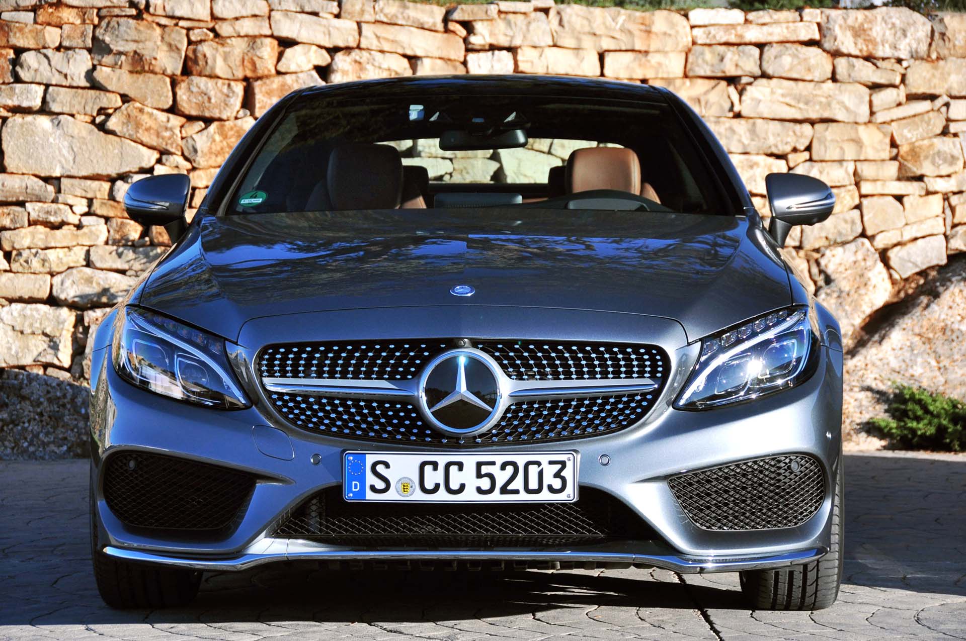 The engine is twice the displacement, adds a turbocharger and puts out almost twice the power as the C 300. It's a 4.0 L twin-turbocharged V8 making 469 hp in the C 63 and 503 hp in the C 63S. Your acceleration times 0-100 km/h are stated as 4.0 and 3.9 seconds respectively. These cars only come with rear-wheel drive.