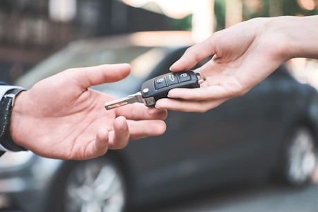 Editorial car key handover gettyimages 1053485392 dima sidelnikov