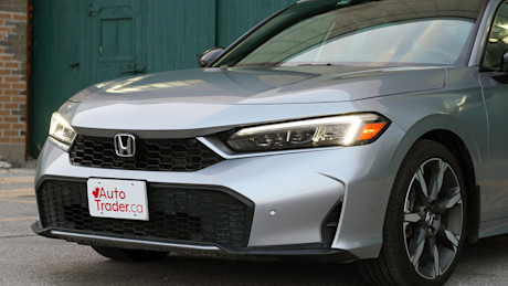 2025 Toyota Prius vs Honda Civic Hybrid Comparison Test Image