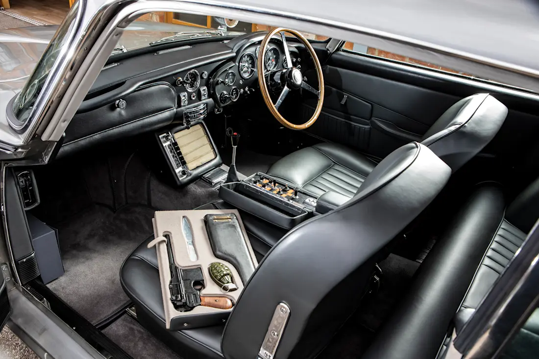 THE-MOST-FAMOUS-CAR-IN-THE-WORLD--RM-SOTHEBY-S-PRESENTS-JAMES-BOND-007-ASTON-MARTIN-DB5 1(1)