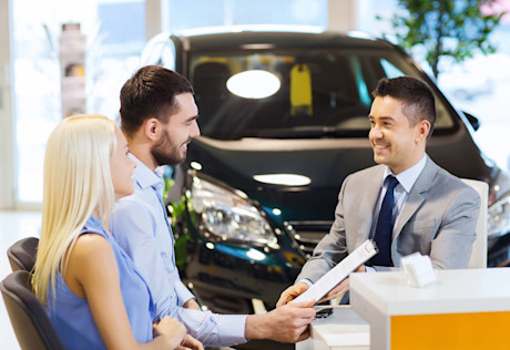 Editorial dealership buying financing leasing couple stock photo syda productions