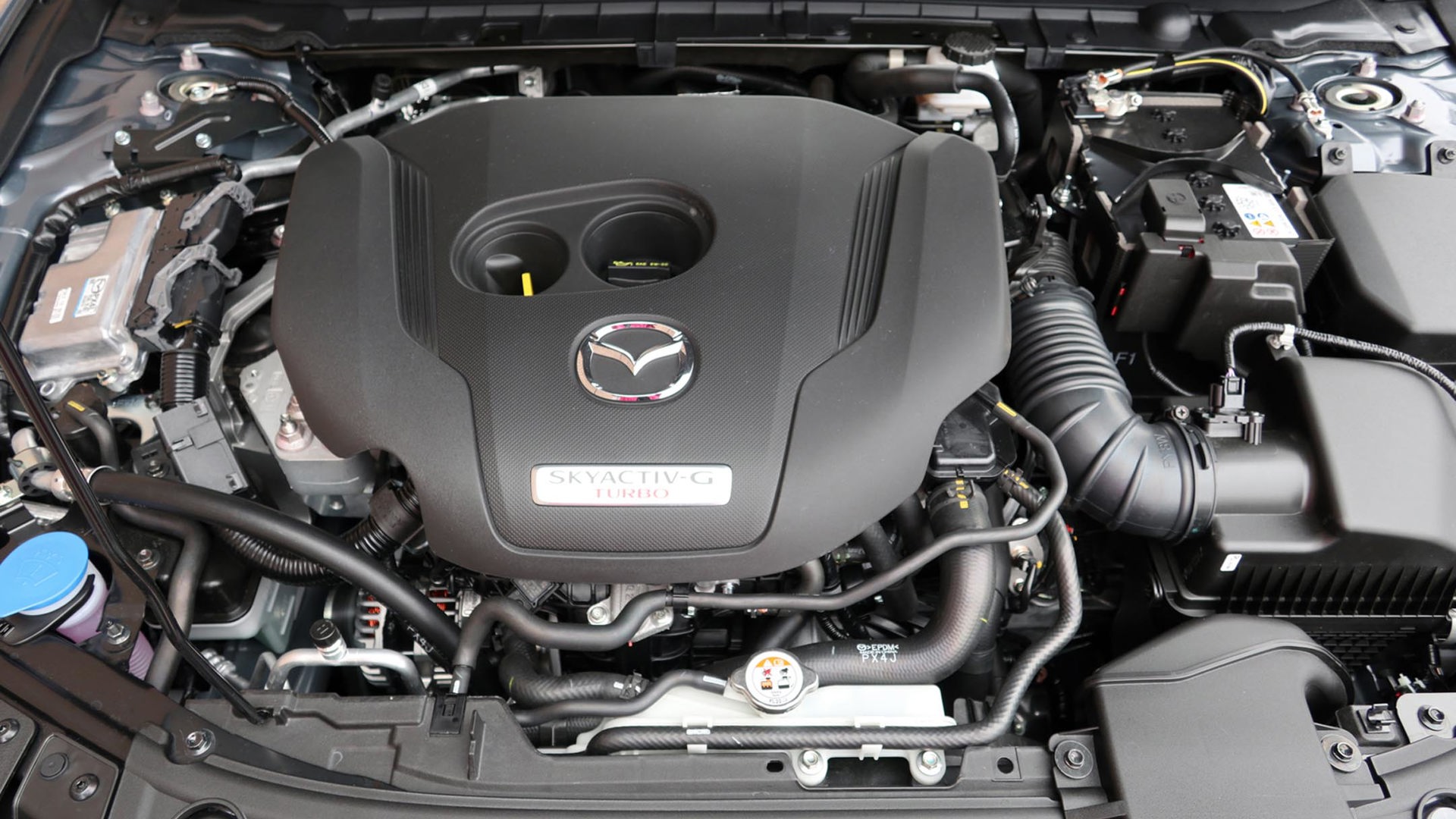 The engine bay of a Mazda 3 Sport GT Turbo