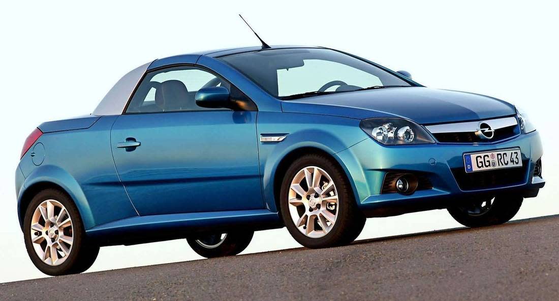 2h9znlNeq9QpHtawMeqsQY-67551c868fe51179da0f56f4e0556007-opel-tigra-twintop-side-1100