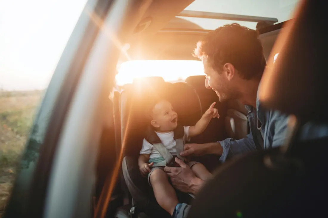 baby seat, baby and a man in a car, family, people, children baby seat, baby and a man in a car, family, people, children
