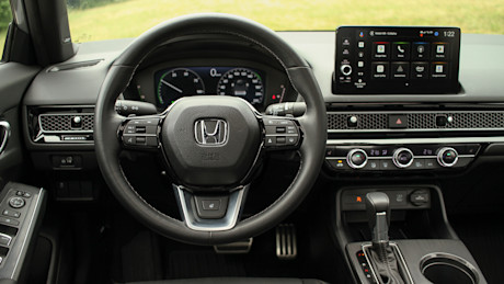 2025 Toyota Prius vs Honda Civic Hybrid Comparison Test Body Image