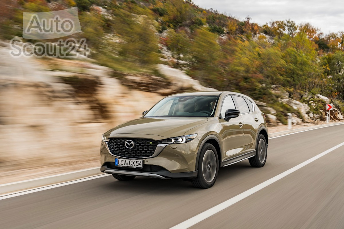 2022_mazda_cx-5_newground_hr_act_08_highres(1).jpg