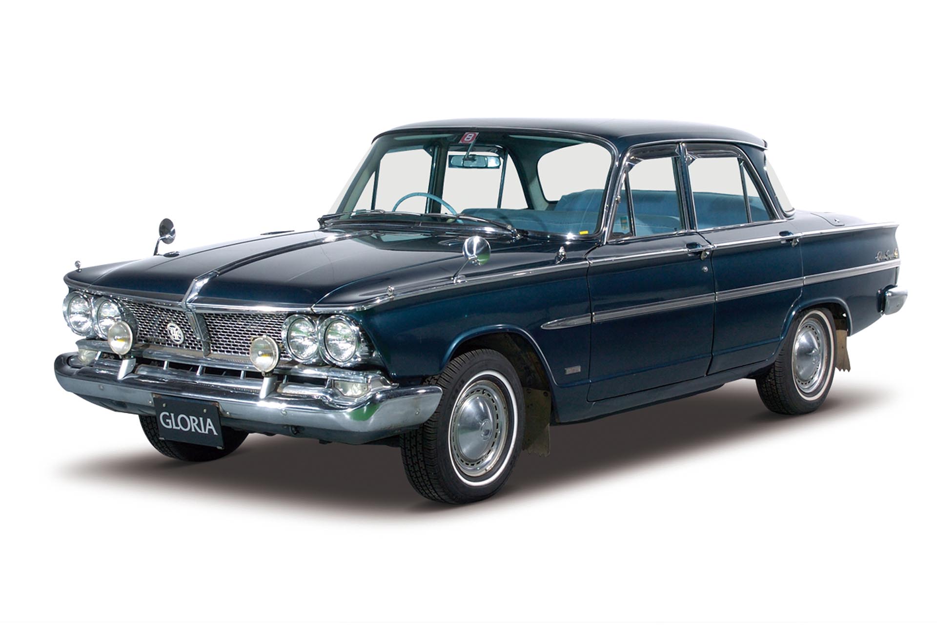 What happened next is the same story that's been repeated over and over again throughout the history of the automobile. Prince also had a large luxury sedan called the Gloria, so they plucked the 2.0L straight-six out of it and stuffed it under the hood of the Prince. This more than doubled the output of this early Skyline racer, giving it enough steam that perhaps a little racing was in order.