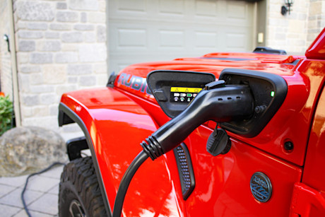 Editorial a06 2021 jeep wrangler 4xe plugged into home charger db