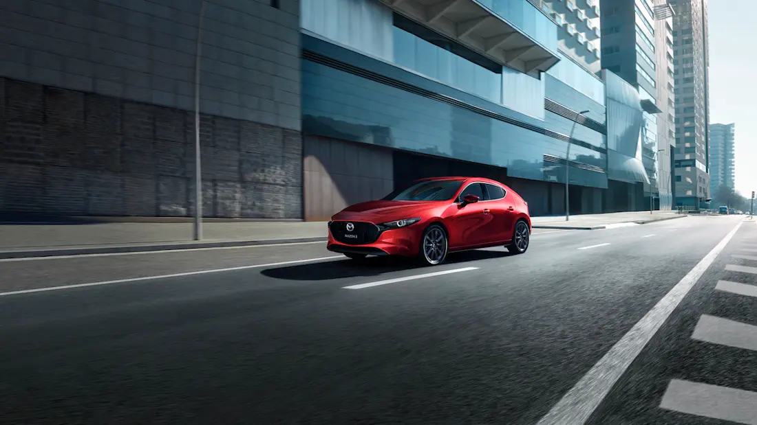 Mazda 3 (2024) dynamic, front view Mazda 3 (2024) dynamic, front view