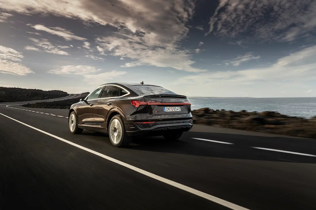 Audi Q8 E-Tron Sportback (2023) dynamic, rear view Audi Q8 E-Tron Sportback (2023) dynamic, rear view