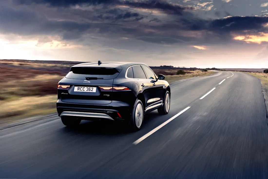 Jaguar F-Pace P400e (2023) dynamic, rear view Jaguar F-Pace P400e (2023) dynamic, rear view